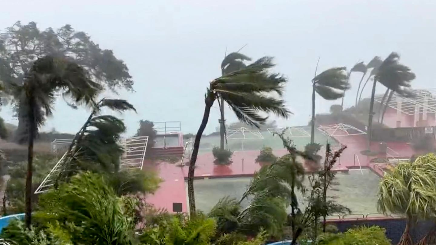 Typhoon Mawar heads to Guam, causing severe weather, power outages